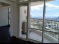 1br-condominium-w-balcony-and-parking-included-at-east-tower-of-twin-oaks-place-small-1