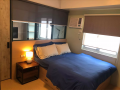 exquisitely-interiored-1br-condo-unit-with-parking-slot-in-bgc-taguig-for-sale-small-0